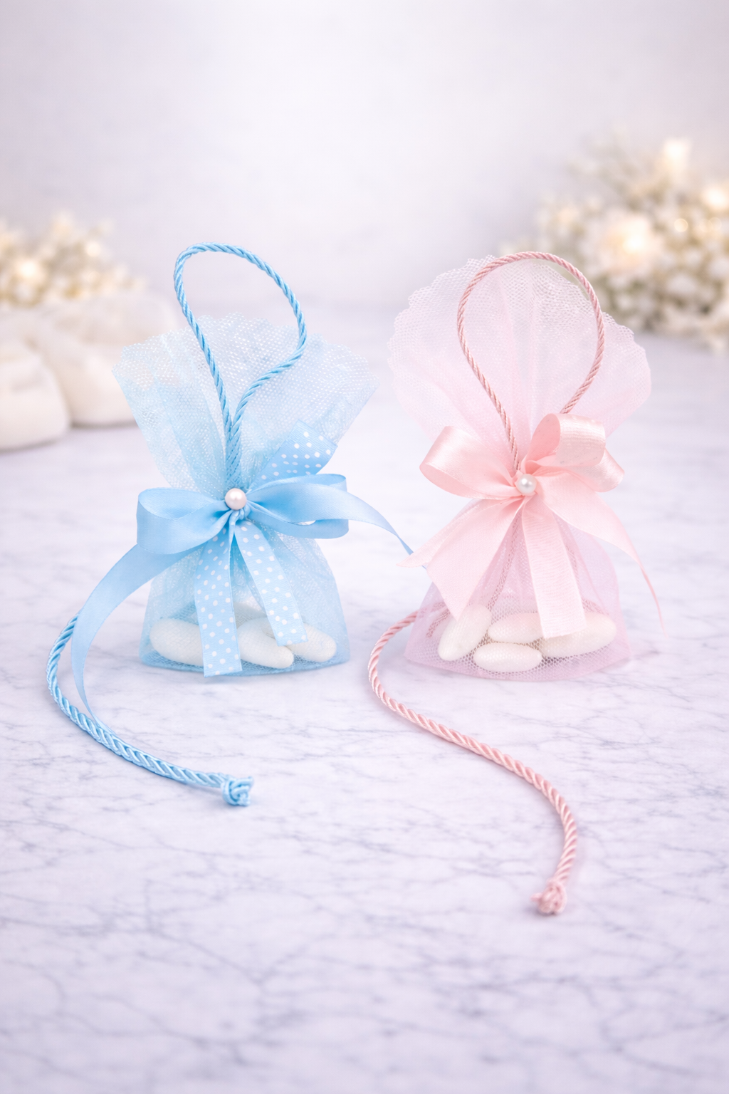 Μπομπονιέρα βάπτισης πουγκί τούλι σε ροζ και γαλάζιο με σατέν κορδέλα και πέρλα