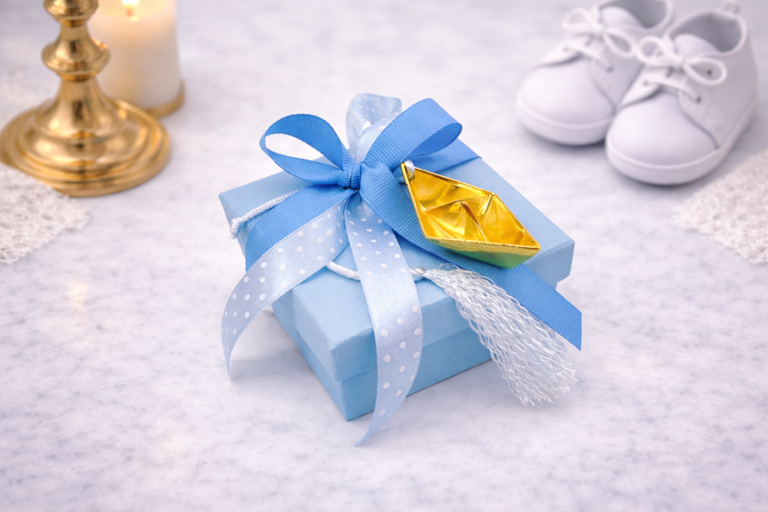 D567B5B9-0C25-4E3E-B195-8B2750A8377D Μπομπονιέρα βάπτισης σιέλ κουτί με χρυσό καραβάκι και μπλε κορδέλες