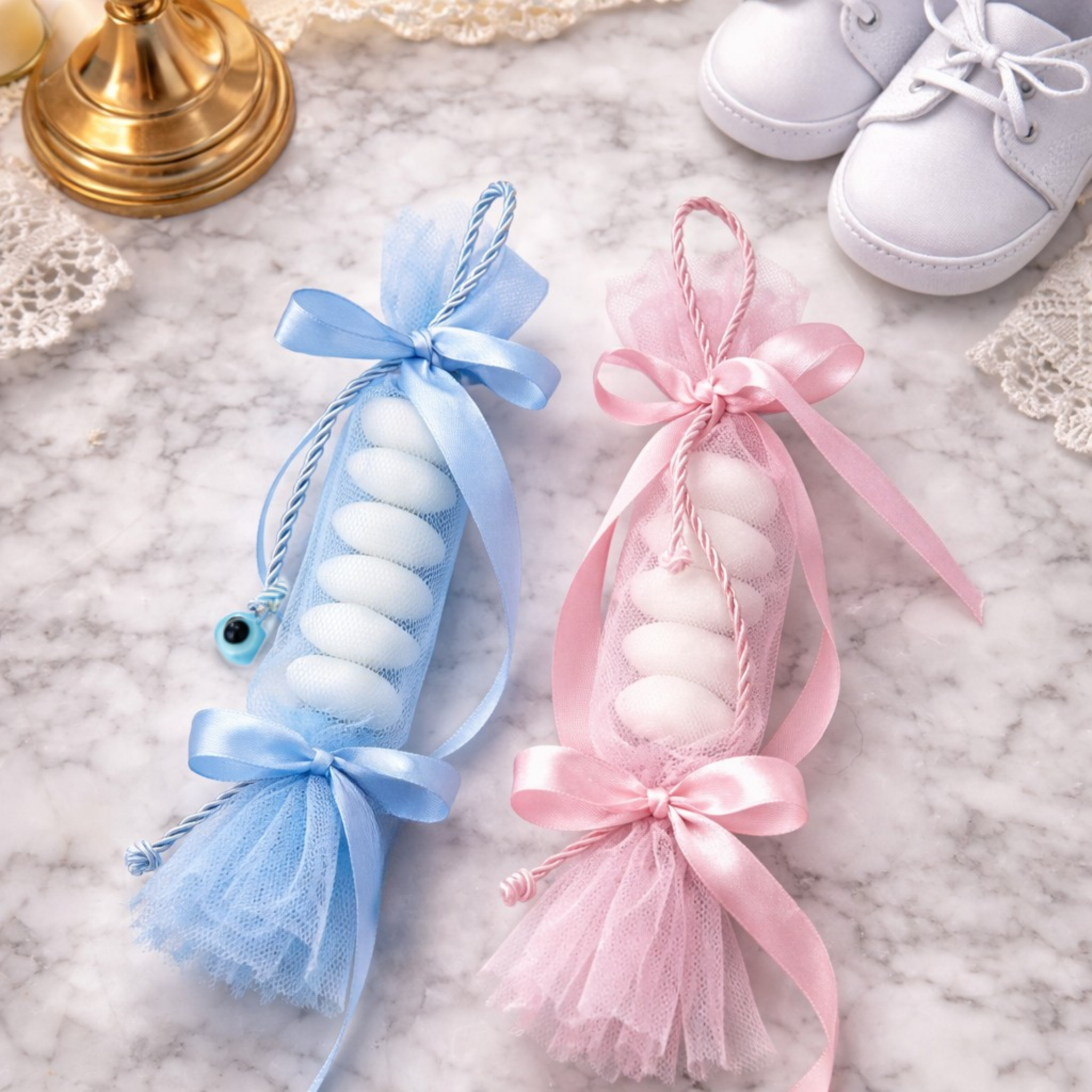 Μπομπονιέρα βάπτισης καραμέλα από τούλι σε ροζ και γαλάζιο