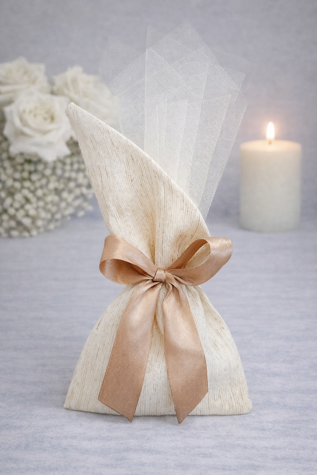 μπομπονιέρα γάμου εκρού τούλι με σατέν κορδέλα σαμπανιζέ